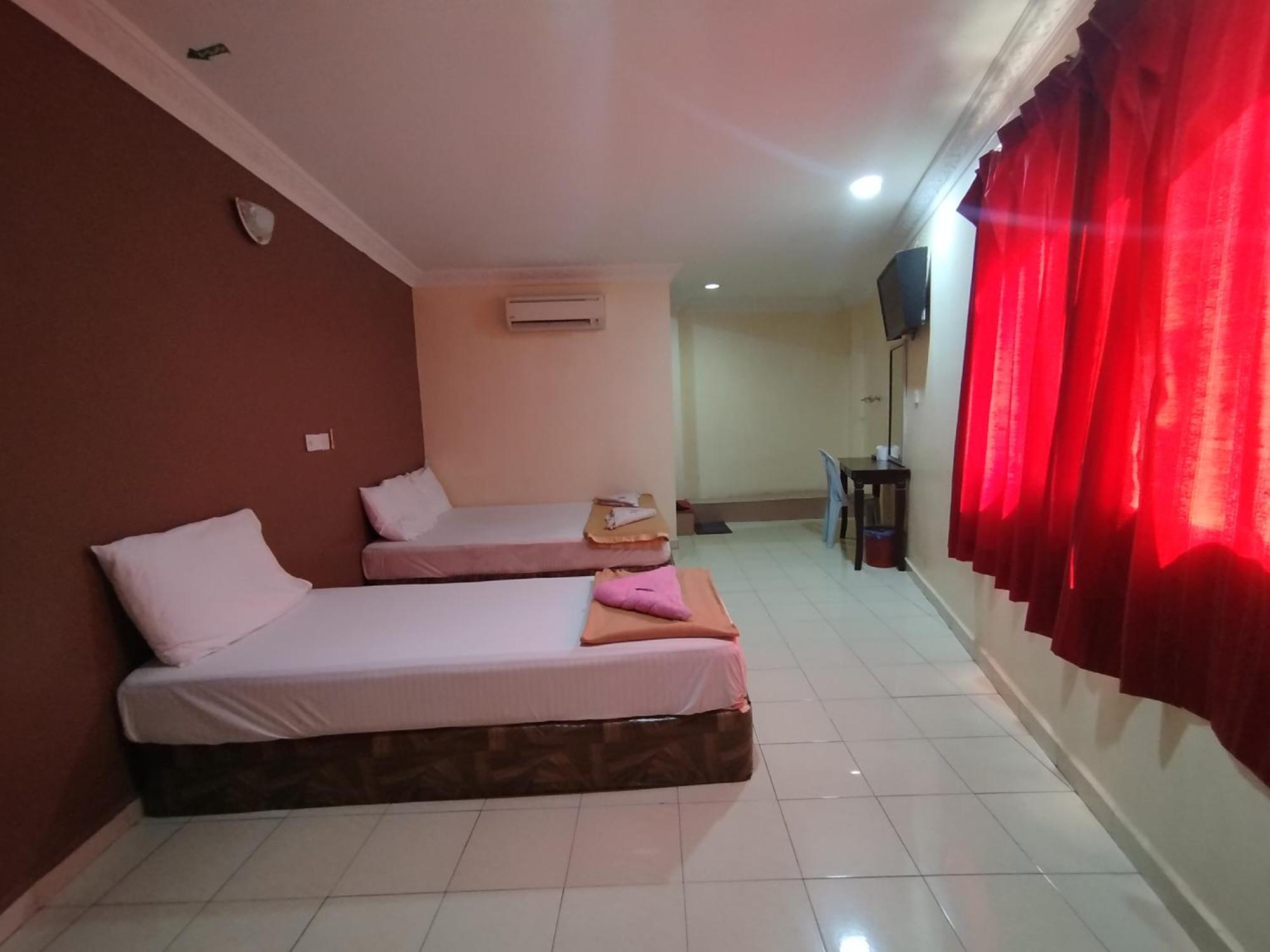 Sentosa Villa Hotel Кланг Екстериор снимка