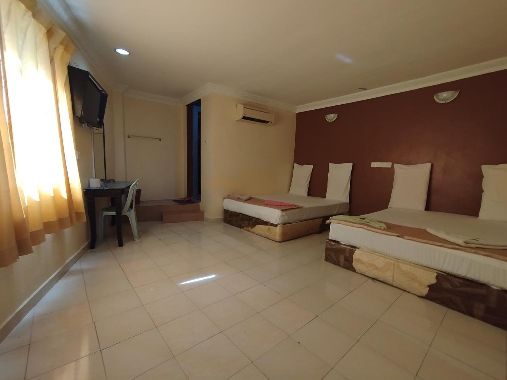Sentosa Villa Hotel Кланг Екстериор снимка