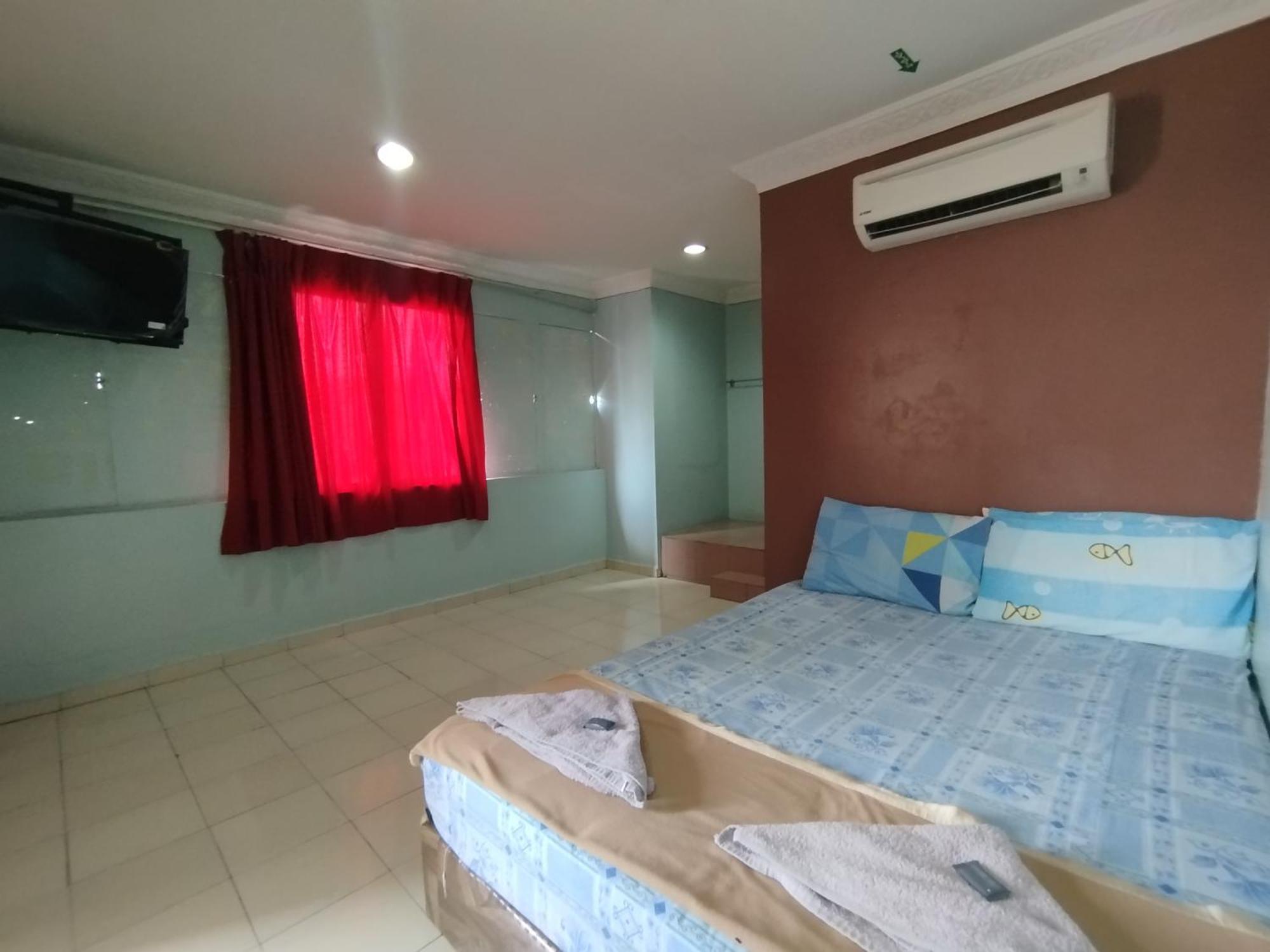 Sentosa Villa Hotel Кланг Екстериор снимка